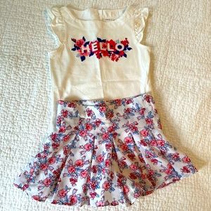Janie and Jack floral shirt and skort outfit.
